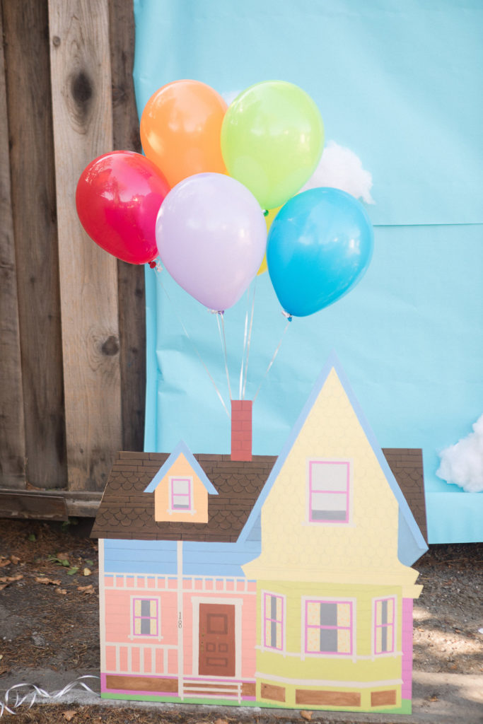 Up house prop with balloons and sky backdrop