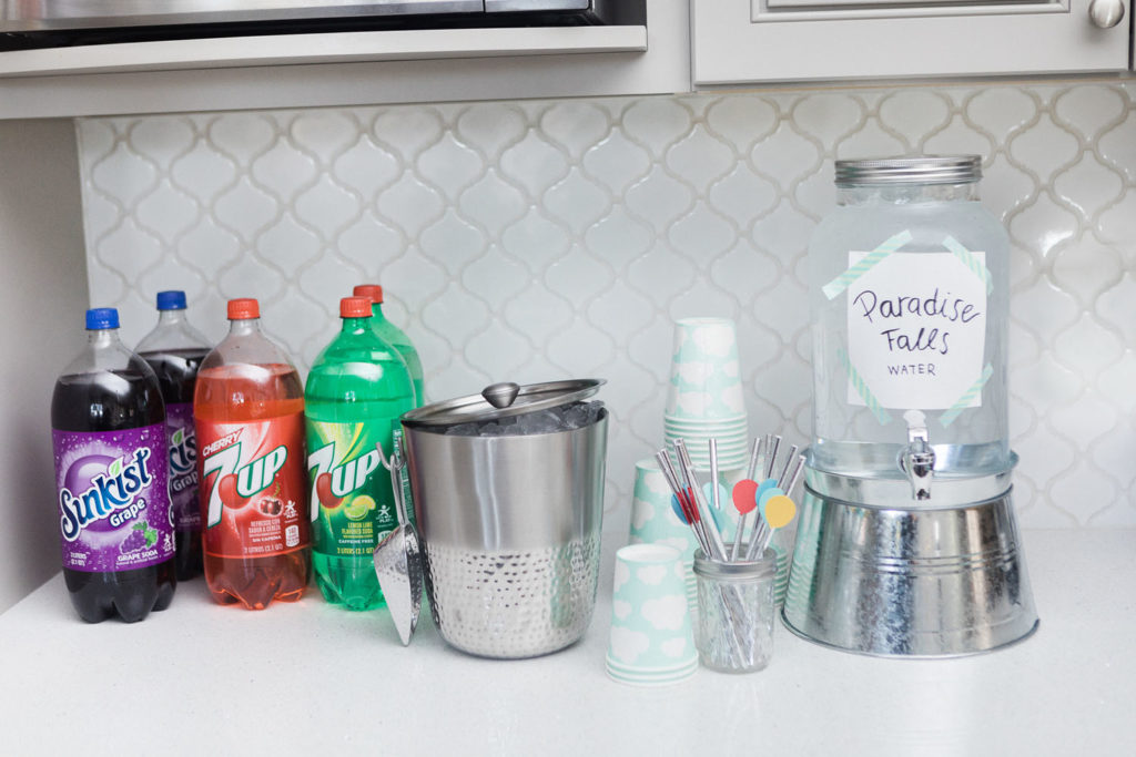 Pixar Up beverage station featuring "Paradise Falls" water, 7UP and grape soda.