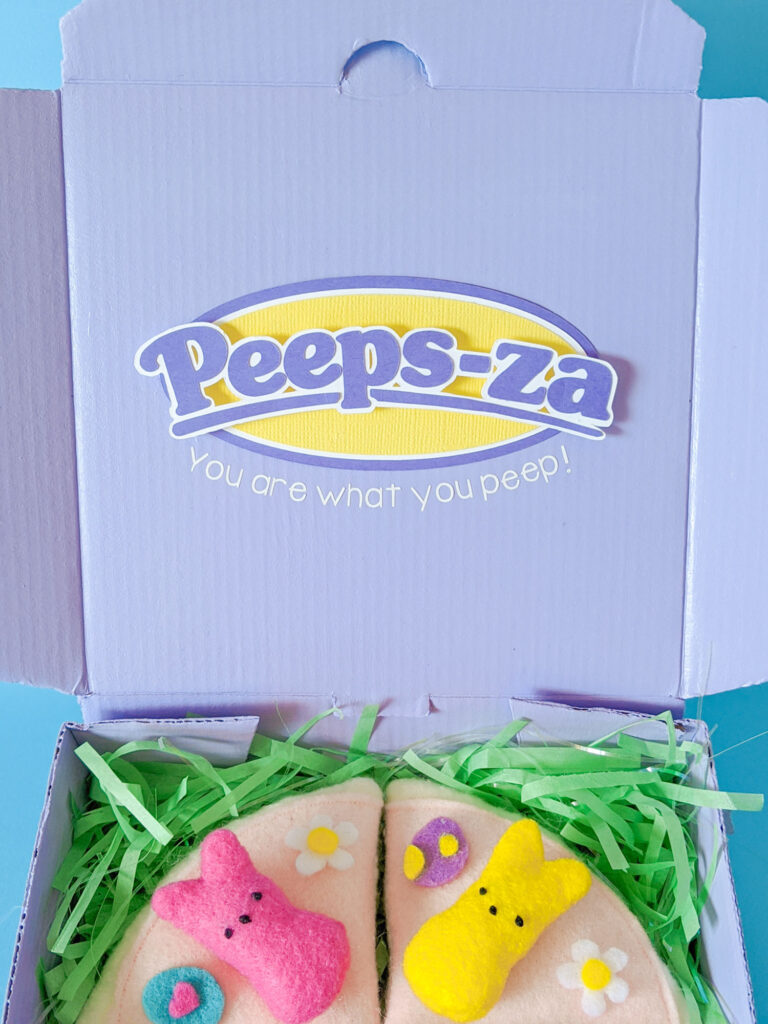 Close-up of Peeps Pizza logo. It says "Peeps-za. You are what you peep"