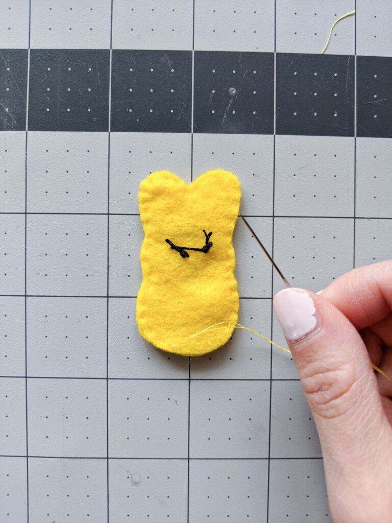 Sewing the front to the back of the Peeps bunny.