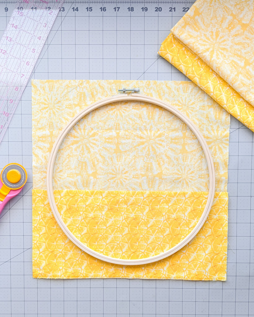 Laying out the yellow fabric for sunshine front door decor