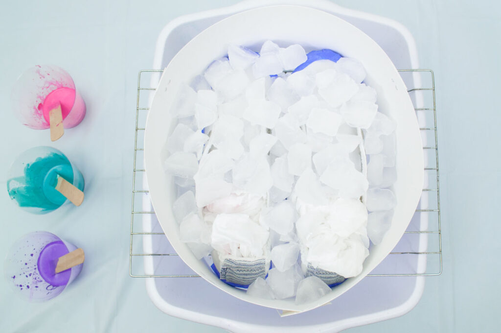 Shoes surrounded with cardstock ring and ice on top