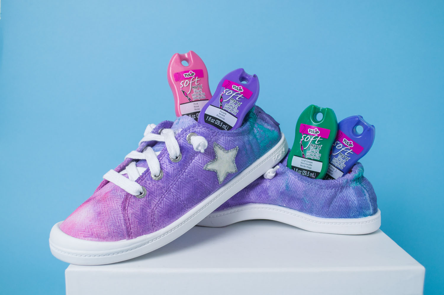 Ice Dyed Shoes in pink, purple and teal. Shown with Tulip fabric paint