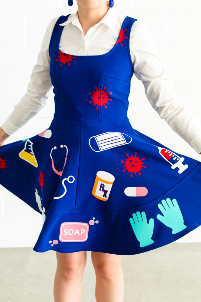 Close up of DIY Ms. Frizzle costume, covered in vinyl designs