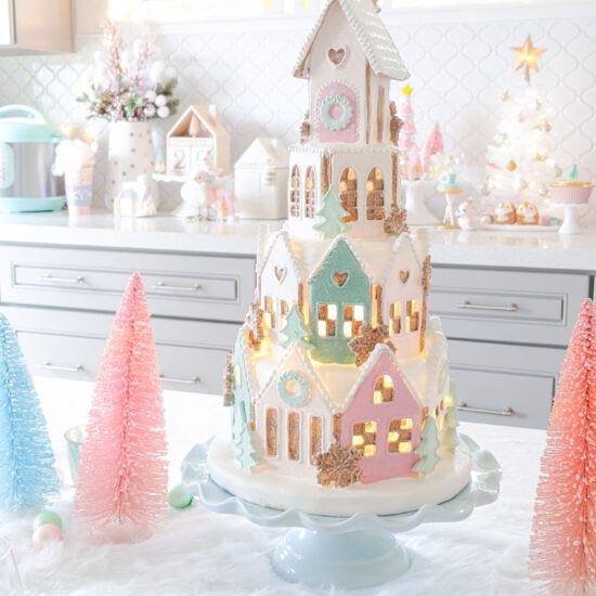 Close up of gingerbread village decor lit up.